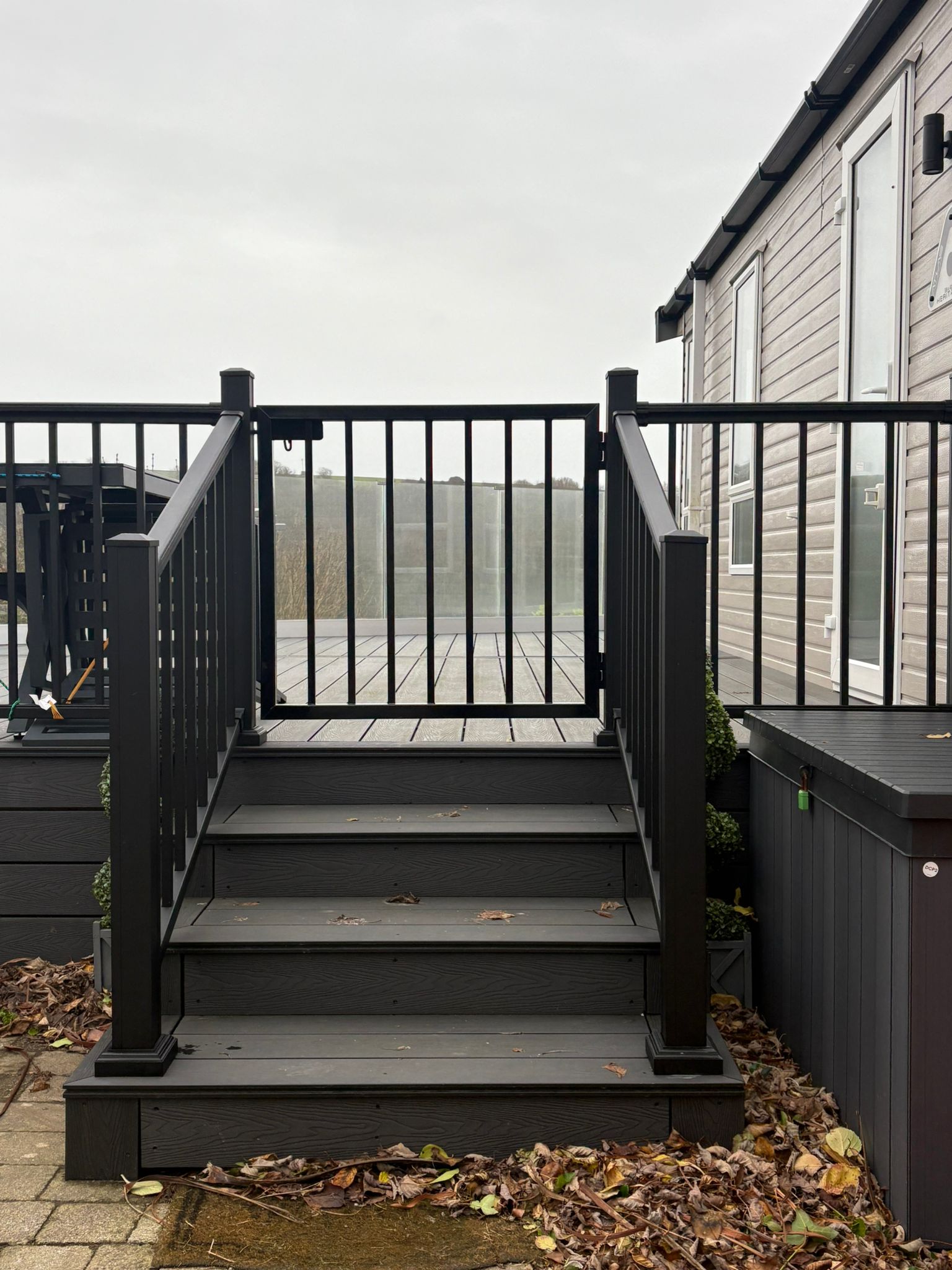 Black steel deck railings and gate